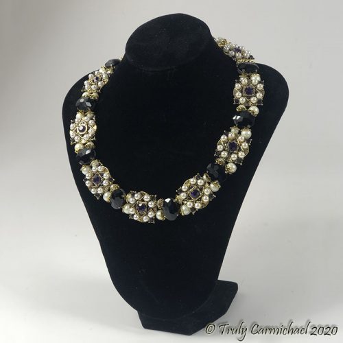 Antique gold with amethyst and jet 17-19"